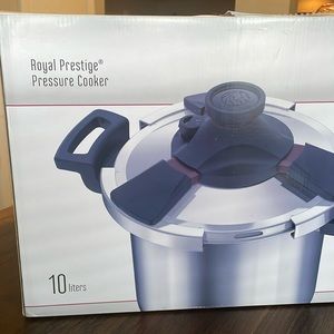 Royal Prestige Pressure Cooker and a recipe book